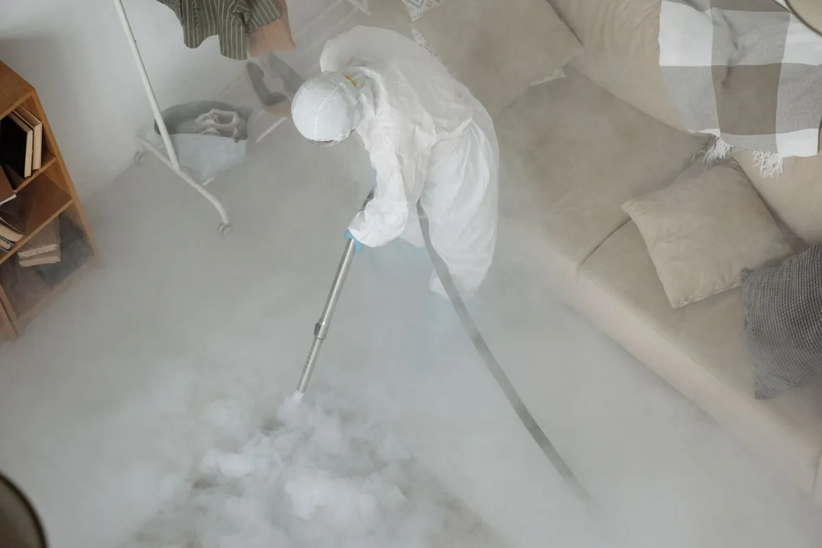 Biohazard cleanup technician in protective equipment, River Glen, San Jose, CA